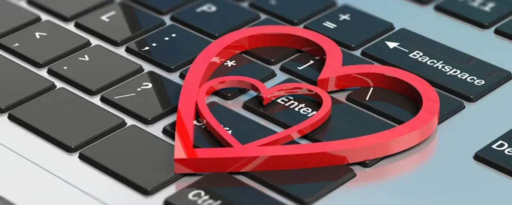 Alles over online daten - Foto online dating rode bijgevoegde harten op een computertoetsenbord 3d illustratie